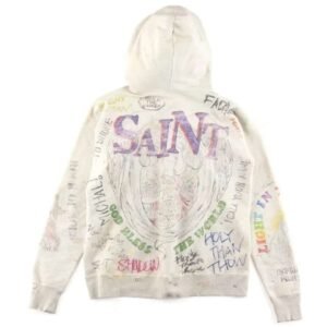 Beige Saint Michael Aged Graffiti Hoodie featuring a vintage graffiti graphic design, streetwear style, and comfortable casual fit.